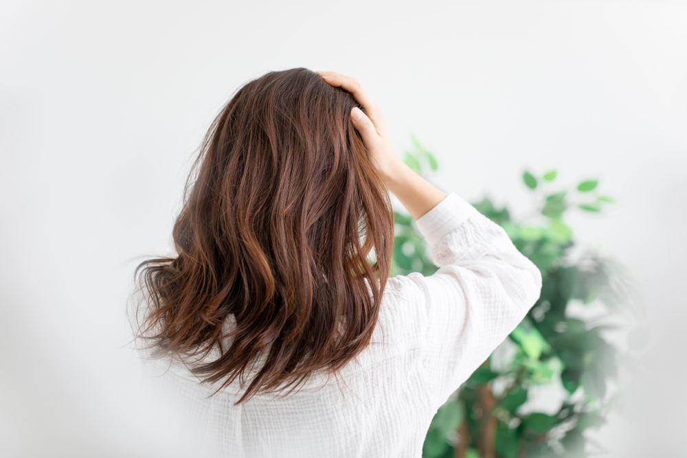 The,Woman,Who,Touches,It,With,Hair